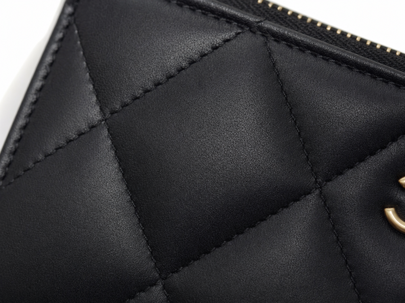 Close-up of Chanel quilted stitching diamond pattern