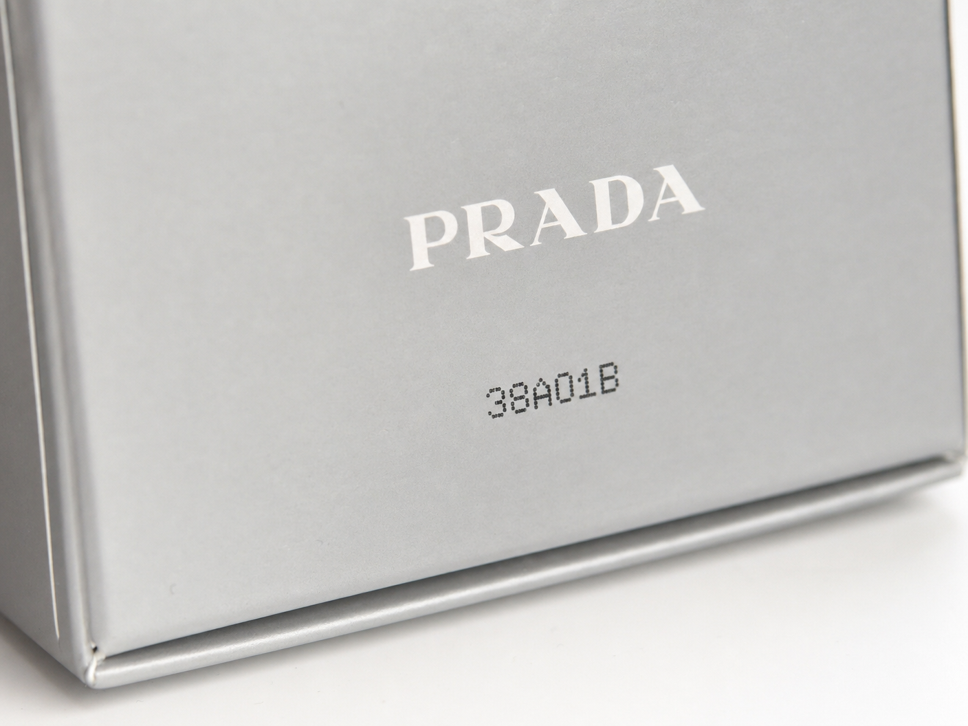 Close-up of Prada batch code on packaging